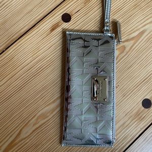 Michael Kors wristlet, gold, perfect condition